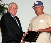 Charlie Hilton, Crop and Soil Sciences, received the 2004 Award of Excellence for Technical Support.