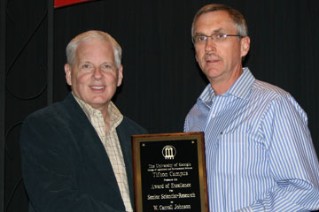 W. Carroll Johnson, USDA-ARS Crop Production and Management Research Unit, received the 2013 Award of Excellence, Senior Research Scientist.