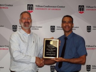 Abolfazl Hajihassani (Junior Scientist-Extension Award of Excellence) with Assistant Dean Michael D Toews