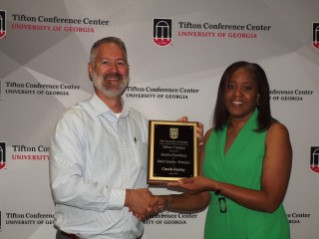 Claudia Dunkley (Senior Scientist-Extension Award of Excellence) with Assistant Dean Michael D Toews
