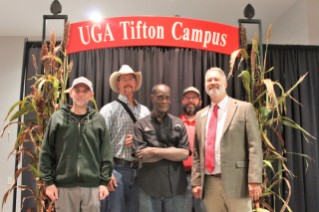 Pictured L to R, receiving 15 years of service awards are Brad Buchanan, Andy Dunn, Thomas Smith and James Wilson with Dr. Michael Toews