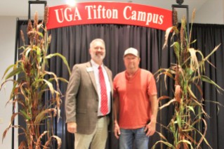 Eric Goodwin (right) presented with 30 years of service award by Dr. Michael Toews