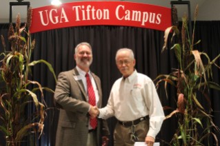 Timothy Brenneman (right) presented with 35 years of service award by Dr. Michael Toews